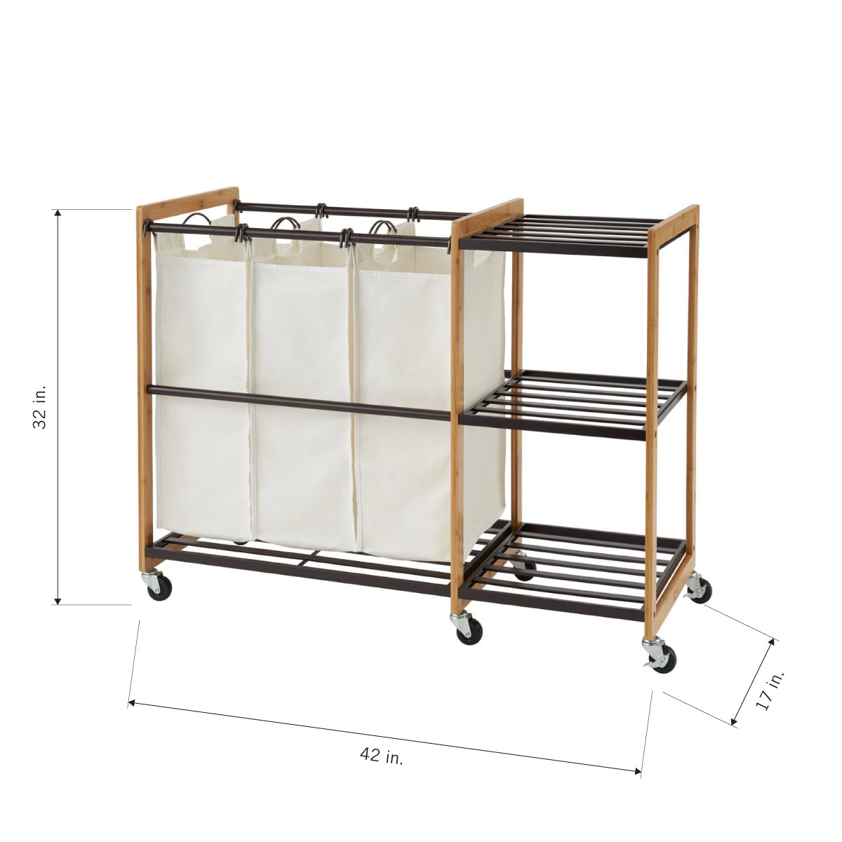 A laundry sorter with a brown bamboo frame and three white fabric laundry bags. The sorter has a multi-level shelf on the side and is on wheels, with dimensions of 42 inches wide, 32 inches high, and 17 inches deep.