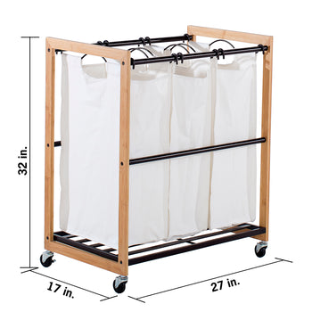 A bamboo laundry hamper with three white, removable bags is shown with dimensions. The hamper is 32 inches tall, 17 inches deep, and 27 inches wide, and has wheels for portability.