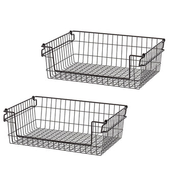 Two black wire baskets are stacked on top of each other, angled slightly to the left, against a white background. The baskets are rectangular with a wire grid base and handle cutouts on the short sides.
