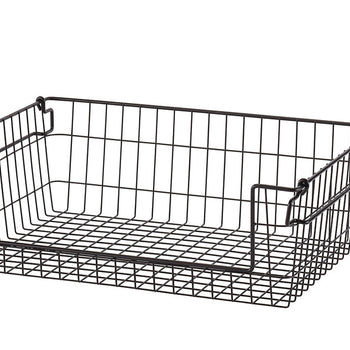 A rectangular wire basket with a black finish, featuring a grid pattern on the bottom and widely spaced vertical wires on the sides. The basket has handles on the short sides, and is photographed against a white background.