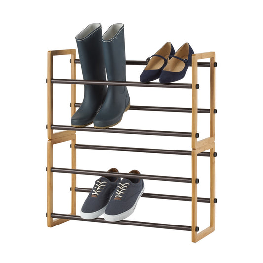 Two shoe rack stacked together vertically, filled with boots, women's shoes and a black sneaker.