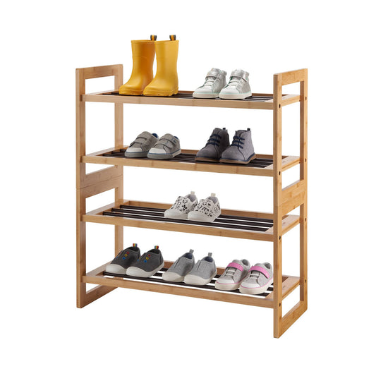 A four-tiered bamboo shoe rack stands against a white background, holding an assortment of footwear. The top shelf displays yellow rain boots and two pairs of light gray sneakers, while the lower shelves contain various sneakers and casual shoes.