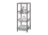 A dark gray metal shelving unit with three wire baskets and a wooden top shelf is displayed against a white background. The shelves hold various bathroom items including towels, lotions, sprays, and candles, suggesting its use for storage.