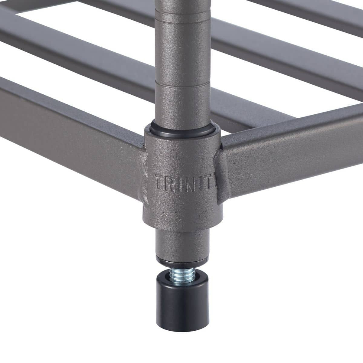 A close-up shows the adjustable leveling foot of a gray metal wire shelf unit. The black foot is threaded and screws into the gray support post, allowing for height adjustments on uneven surfaces.