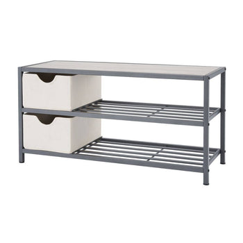 A three-tiered slate gray shoe bench with a light gray top and two off-white fabric storage baskets on the left side. The two lower tiers are slatted metal shelves for shoes.