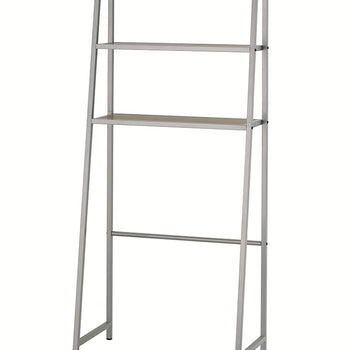 A simple, free-standing metal A-frame over-the-toilet étagère is depicted against a white background. It features a silver metal frame with two light oak-colored wood shelves and is shown without any decorative items.