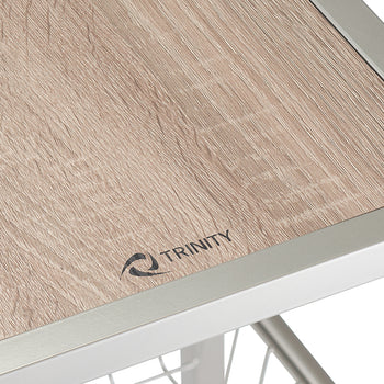 A close-up shot shows a light brown, wood-grain tabletop with a metallic silver frame. The word 