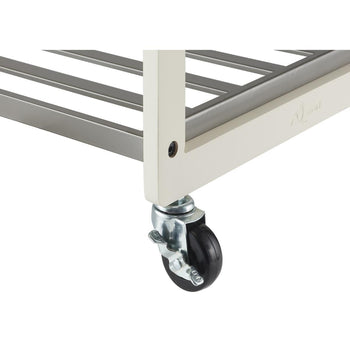 A black caster wheel with a silver-toned metal bracket and a locking lever is visible, attached to the leg of the cart.