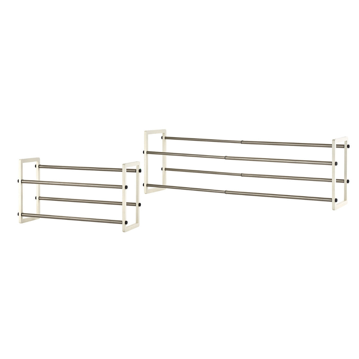 Two Trinity Basics Expandable Shoe Racks. The racks are made of metal and can be expanded to fit different spaces.