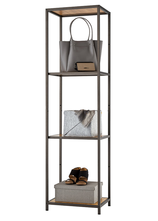 This tall, narrow four-tier shelving unit features a textured dark bronze metal frame with wood-grain accent panels on the top and bottom shelves. It is organized with everyday essentials, including a grey leather handbag and wallet on the second tier, a grey fabric storage bin on the third, and a pair of black sandals atop a woven storage box on the bottom shelf.