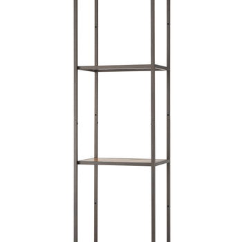 A tall and narrow four-tiered bookshelf stands against a white background. The frame is dark metal, and the shelves appear to be made of light-colored bamboo.