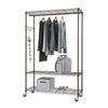 A bronze anthracite metal rolling closet organizer with 3 shelves and 1 hanging rod filled with clothes, a bag, and shoe.