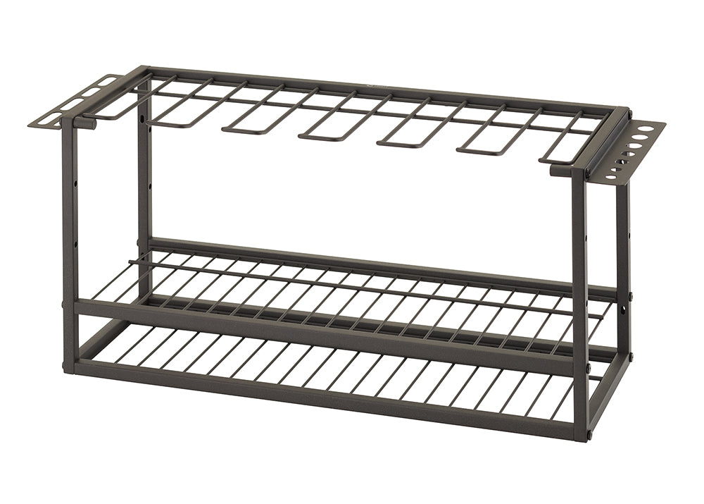 A two-tier, dark gray metal stand. The top tier is designed to hold several long-handled tools, while the bottom tier is a grid shelf for other items.