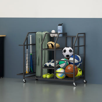 A black rolling sports equipment rack is shown fully organized with various balls, bats, gloves, and sneakers against a garage wall. All items are neatly categorized and stored within the multi-level sections of the cart, showcasing its storage capabilities.
