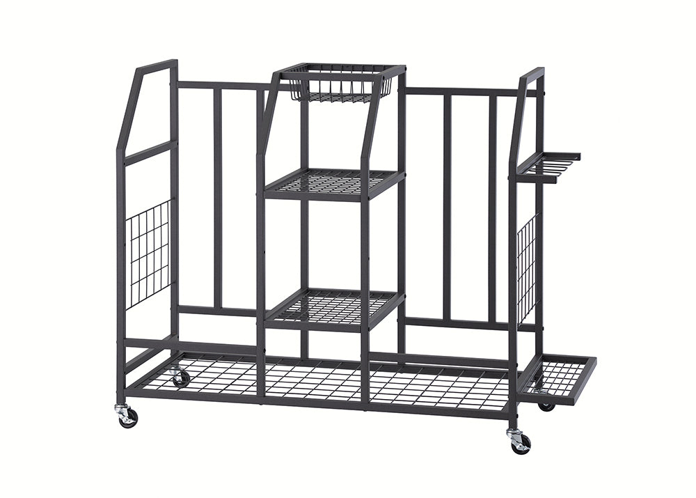An empty black metal rolling storage rack is displayed against a plain white background, featuring a variety of multi-level shelves and vertical partitions. The design includes a mesh bottom, a small top basket, and specialized side slots supported by four lockable caster wheels.