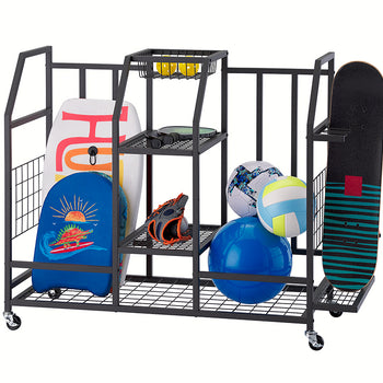 A black metal rolling sports equipment cart holds a skateboard, several balls, a baseball glove, two bodyboards, and other sports items, demonstrating its storage capacity against a plain white background. The cart is organized with various sections, shelves, and a mesh bottom.