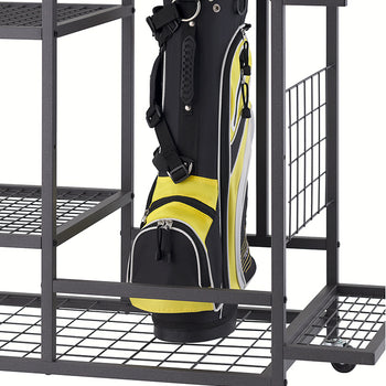 A black and yellow golf stand bag with visible clubs sits on the wire mesh bottom shelf of a black metal rolling rack. The rack includes side partitions and caster wheels for mobility, shown against a white background.