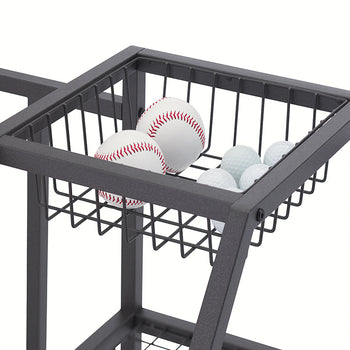 A close-up view shows a black wire basket integrated into the top of a metal storage rack, holding two baseballs and several golf balls. The basket is part of a sturdy, industrial-style frame designed for organizing sports equipment.