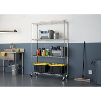 A four-tier wire chrome shelving unit, likely the Trinity EcoStorage 4-Tier Wire Shelving Rack, in a garage or utility room setting. The shelves hold various storage containers and cleaning supplies, illustrating its organizational capabilities.