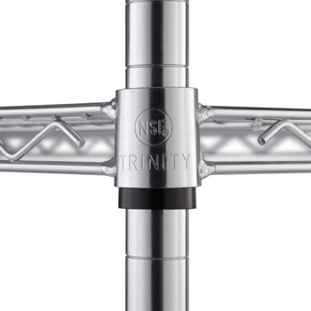 A close-up shows the connection point of a shelf to a vertical pole on a chrome wire shelving unit. The black plastic piece securing the shelf to the pole features the word 