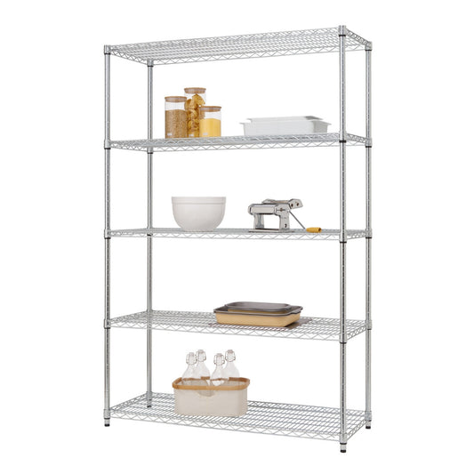 A tall, five-tier wire shelving unit stands against a white background, holding various kitchen items. The shelves contain jars of food, a white bowl, a pasta maker, baking dishes, and bottles in a container.