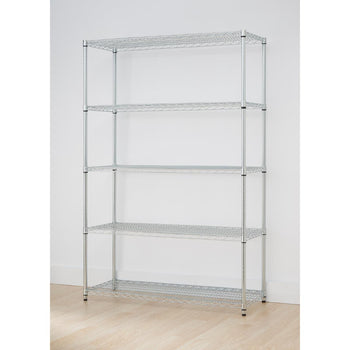 A chrome metal five-tier utility shelving unit stands against a white wall. The shelves are made of a wire grid, and the unit has four vertical poles with black plastic shelf supports.