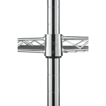 Close-up view of a chrome wire shelving unit's pole and shelf connection. A black plastic sleeve with the 
