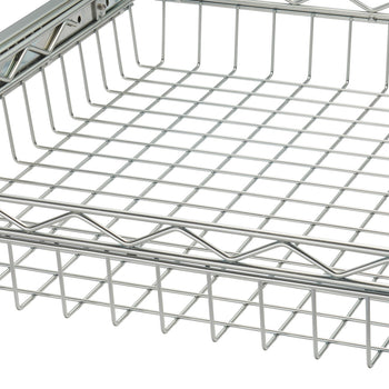 A close-up shows a section of a shiny, silver wire mesh basket or tray. The grid pattern of the mesh is clearly visible, with thicker wires forming the perimeter and supporting structure.
