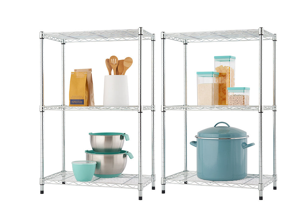 Two identical, three-tier wire shelving racks are shown side-by-side, each filled with various kitchen items. The left rack holds brown paper bags, a white utensil holder with wooden spoons, and two stainless steel bowls with a teal cup, while the right rack displays clear containers filled with grains and a large teal pot.