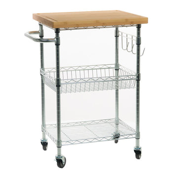 A chrome kitchen cart with a light brown bamboo cutting board top is shown against a white background. The cart has two wire shelves, a side handle, and hooks for hanging utensils with four wheels for mobility.