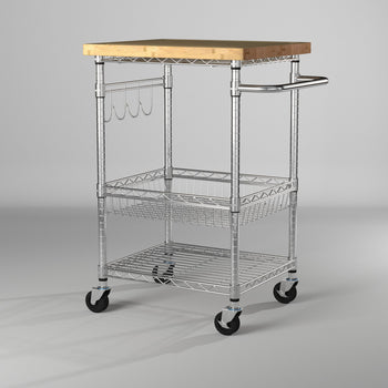 A chrome color kitchen cart on wheels features a light brown wooden countertop. Below the countertop, there is a wire basket and an additional wire shelf, providing storage. On the side, there are hooks for hanging items and a curved handle.