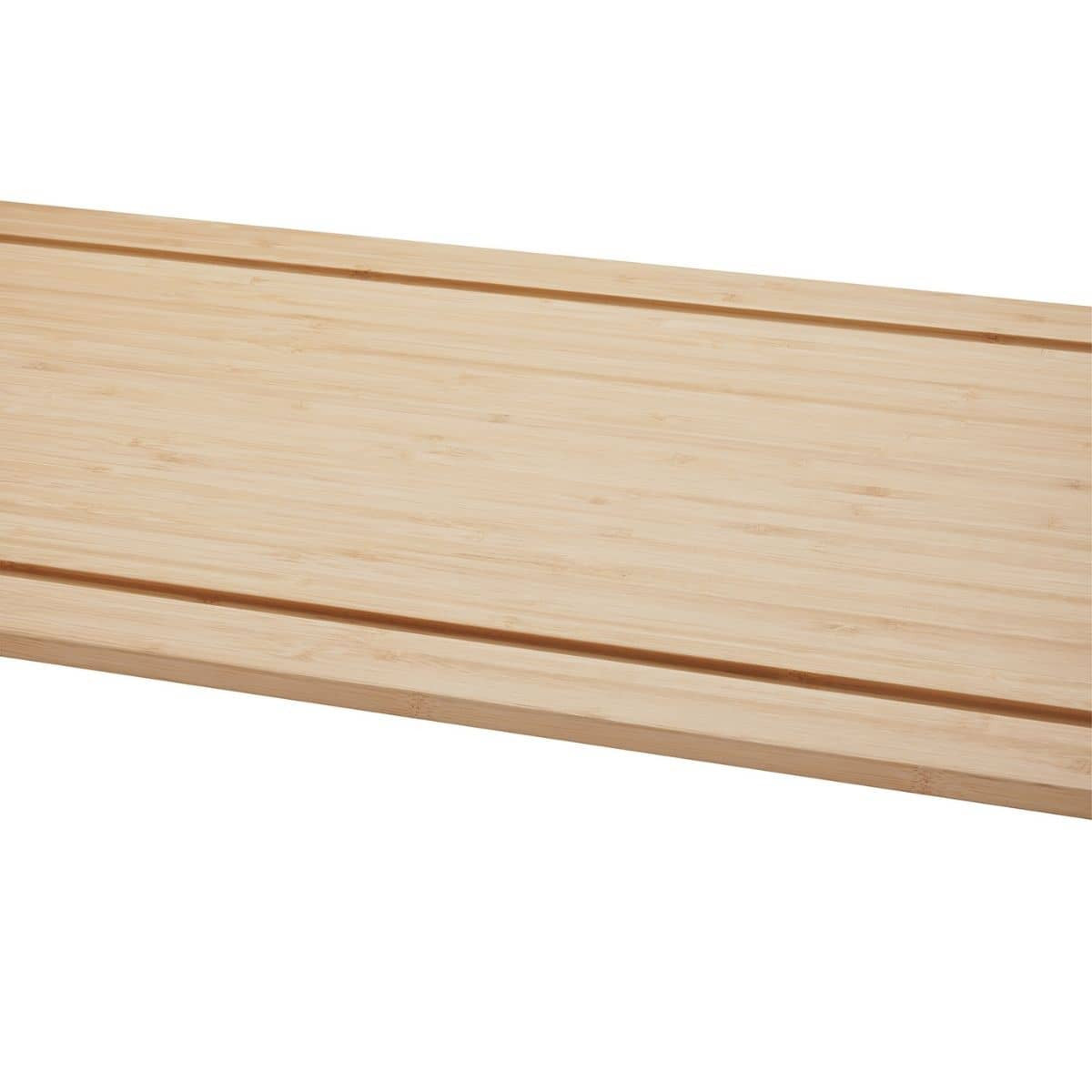 A close-up shows a light-colored wooden surface, possibly bamboo, with two parallel grooves running horizontally across it. The texture of the wood grain is visible, suggesting a smooth, possibly finished surface.