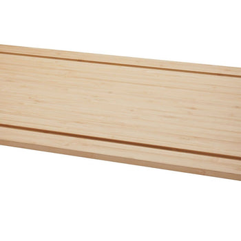 A close-up shows a light-colored wooden surface, possibly bamboo, with two parallel grooves running horizontally across it. The texture of the wood grain is visible, suggesting a smooth, possibly finished surface.