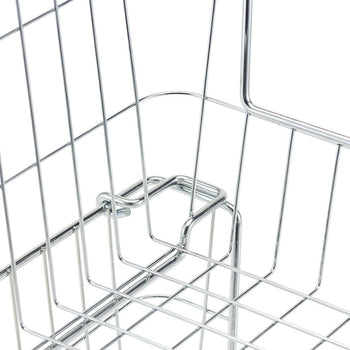 A close-up shot shows the corner of a chrome wire basket, highlighting the construction with thin, parallel wires and a small hook-like detail. The focus is on the intricate wire pattern and the basket's shiny, reflective surface.