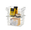 A stackable wire storage basket holds various household items, including heavy-duty cleaning wipes, a black and yellow container, rolls of masking tape, and LED light bulb boxes. The metal basket has two tiers and is designed for organizing supplies.
