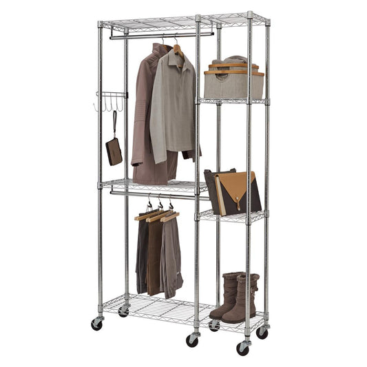 A chrome wire shelving unit on wheels serves as a closet organizer. It features hanging rods for clothes, multiple shelves holding bags, shoes, and a storage box, and hooks for accessories.