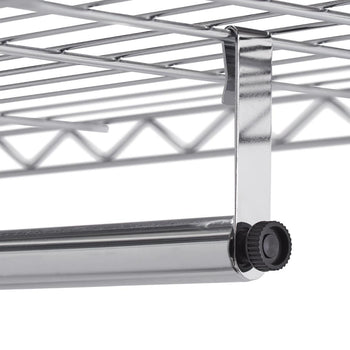 A close-up shows a shiny, chrome-colored metal rod hanging from a wire shelf. The rod is attached with a hook that clamps over one of the shelf wires and is secured with a black, textured knob on the visible end.