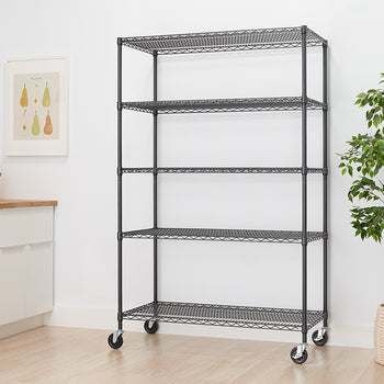 A tall, five-shelf wire shelving unit with a black finish is shown in a modern kitchen. The unit has wheels, suggesting it is mobile, and is empty, waiting to be used.