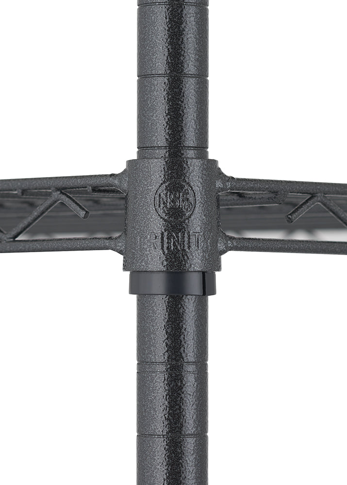 A close-up photograph focuses on the intersection of a metal wire shelving unit, showing a black wire shelf connected to a textured black support pole. The shelf connector is secured to the pole and features the embossed TRINITY name and the NSF certification logo within a circular design.