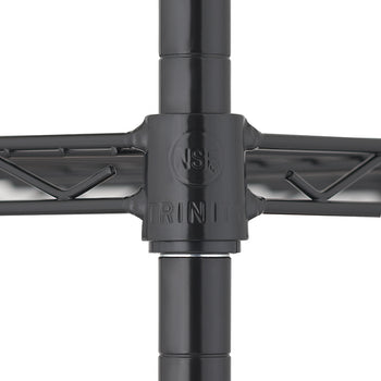 A close-up photograph focuses on the intersection of black wire shelving units and a support pole. A black plastic connector, marked with NSF and TRINITY, fastens the wire shelf to the vertical pole.
