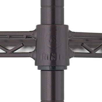 A close-up photograph focuses on the intersection of four posts and a wire shelf of a metal shelving unit. The center connector, which joins the vertical posts and horizontal shelves, is a dark bronze color and has the word 