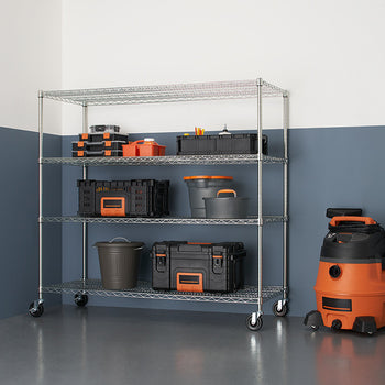 A 4-tier wire shelving unit with wheels, filled with various storage containers, stands against a two-tone wall with a glossy floor. An orange wet/dry vacuum is positioned to the right of the shelving unit.