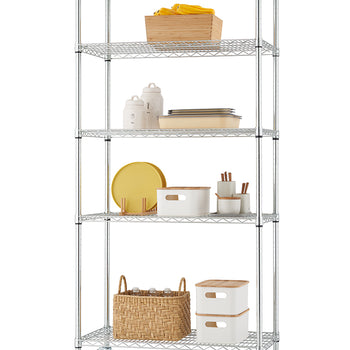 A full-height, five-tier chrome wire shelving unit is on wheels. The shelves are organized with kitchen items, including serving dishes, food canisters, and woven baskets.