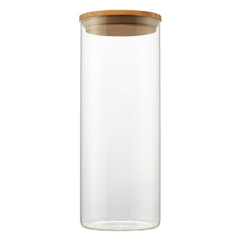A clear, tall cylindrical glass canister stands upright, sealed with a round, light brown bamboo lid. The canister is empty and isolated against a white background.