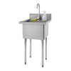 A freestanding stainless steel utility sink with a single bowl, a chrome gooseneck faucet, and four cylindrical legs with gray non-slip feet is shown against a white background. A yellow sponge and a white spray bottle of cleaning solution rest on the sink's backsplash.