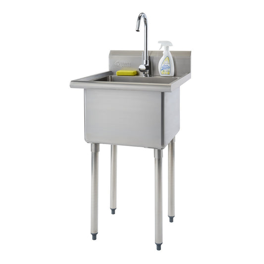 A freestanding stainless steel utility sink with a single bowl, a chrome gooseneck faucet, and four cylindrical legs with gray non-slip feet is shown against a white background. A yellow sponge and a white spray bottle of cleaning solution rest on the sink's backsplash.