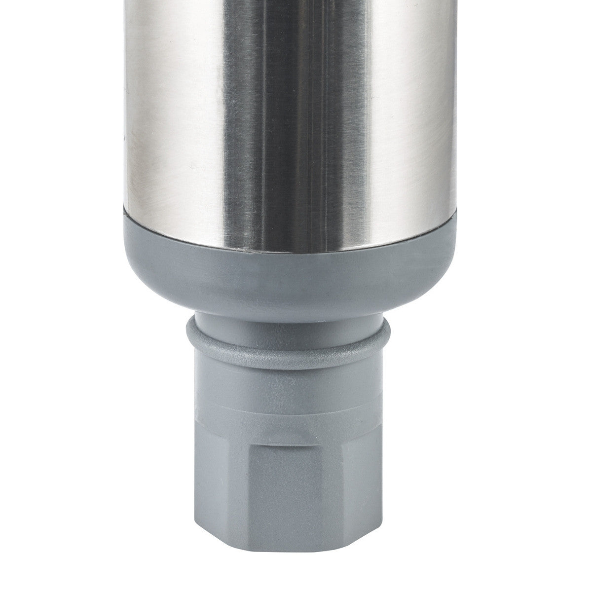Close-up of the bottom portion of a stainless steel cylindrical object connected to a gray, hexagonal base. A gray, ridged connector piece sits between the stainless steel and the hexagonal base.