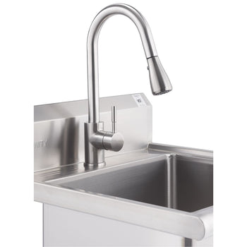 A close-up shot shows a stainless steel utility sink with two basins and a tall, curved pull-out faucet. The faucet has a single lever handle and a sprayer head.