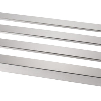 A close-up shot of a flat, rectangular metal surface with three evenly spaced, rectangular cutouts. The metal appears to be brushed stainless steel and the cutouts have rounded corners.