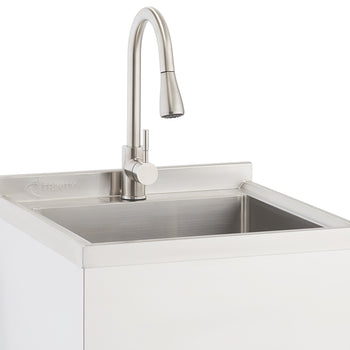 A close-up shot shows a stainless steel utility sink with a brushed nickel gooseneck faucet. The sink is integrated into a white cabinet base, and the Trinity logo is visible on the backsplash.
